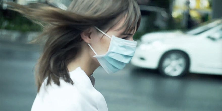 woman wearing mask